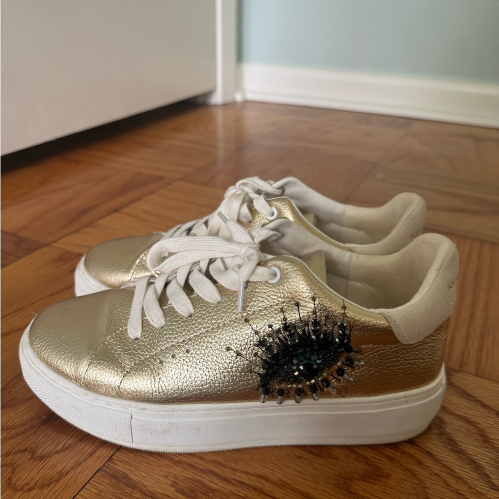 Kurt Geiger Gold Sneakers with Eye Detail